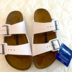 Brand new with tags Birkenstock Arizona sandals. White. Women's size 4
